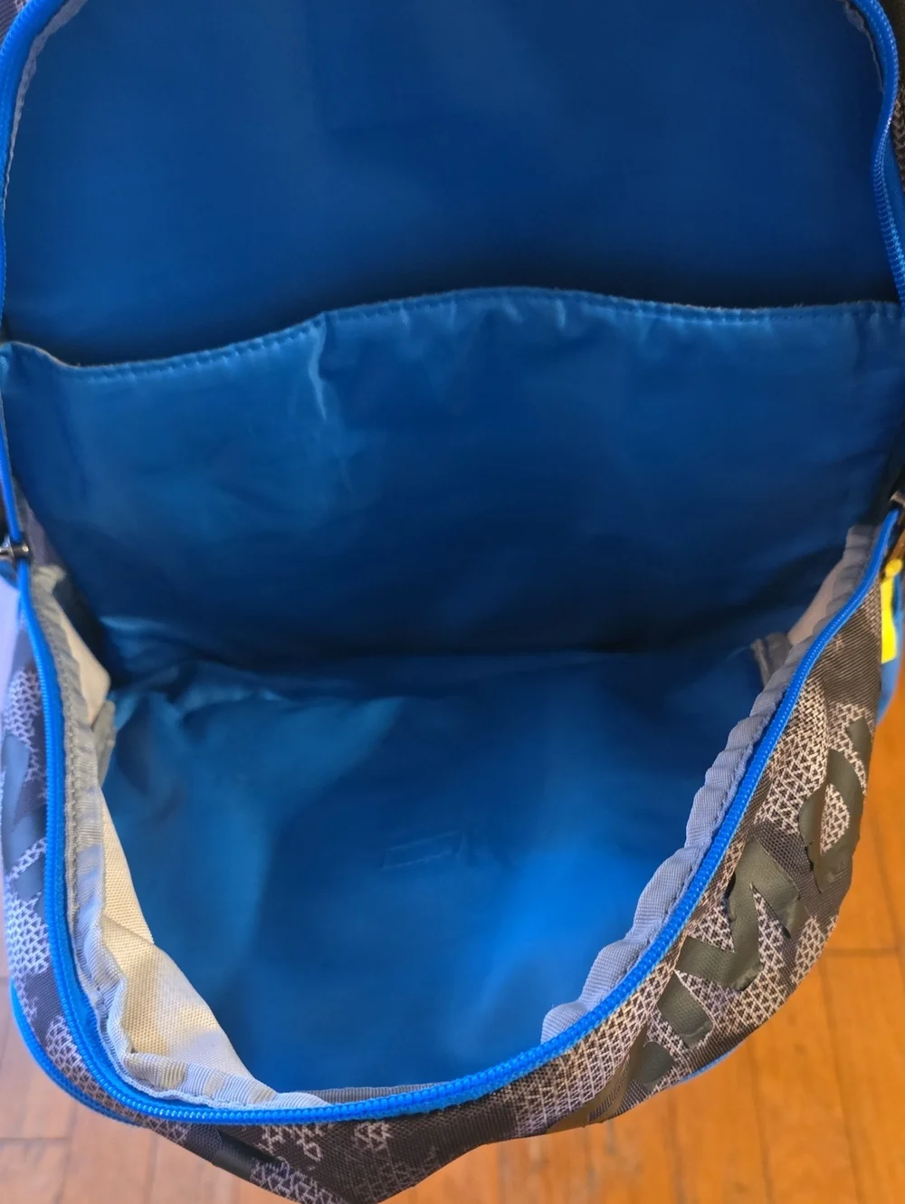 Under Armour Blue and Black Camo  Backpack with Neon Accents